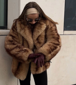 Veste courte en fausse fourrure femme