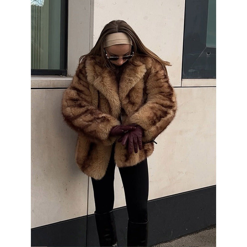 Veste courte en fausse fourrure femme