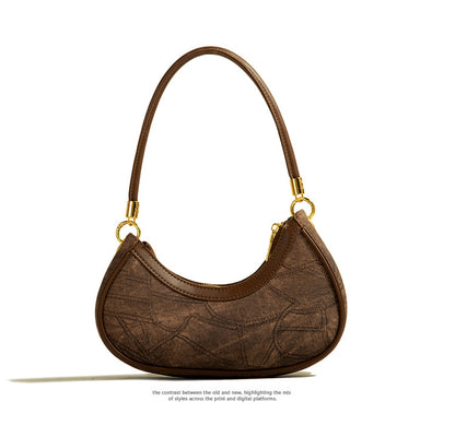 Kesperi – Sac Bandoulière Texturé en Forme de Croissant